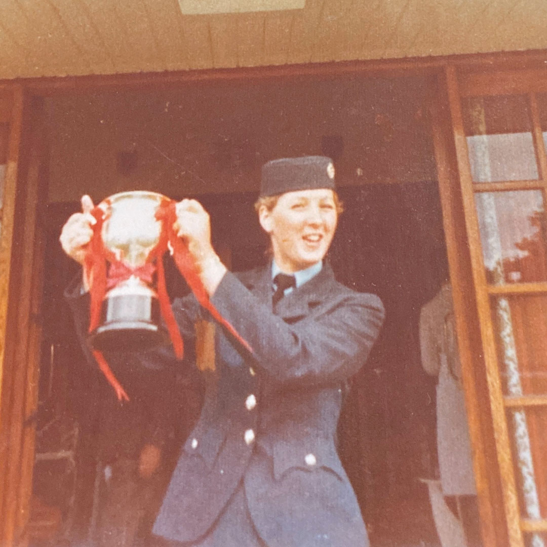 Karen Swift holding a trophy